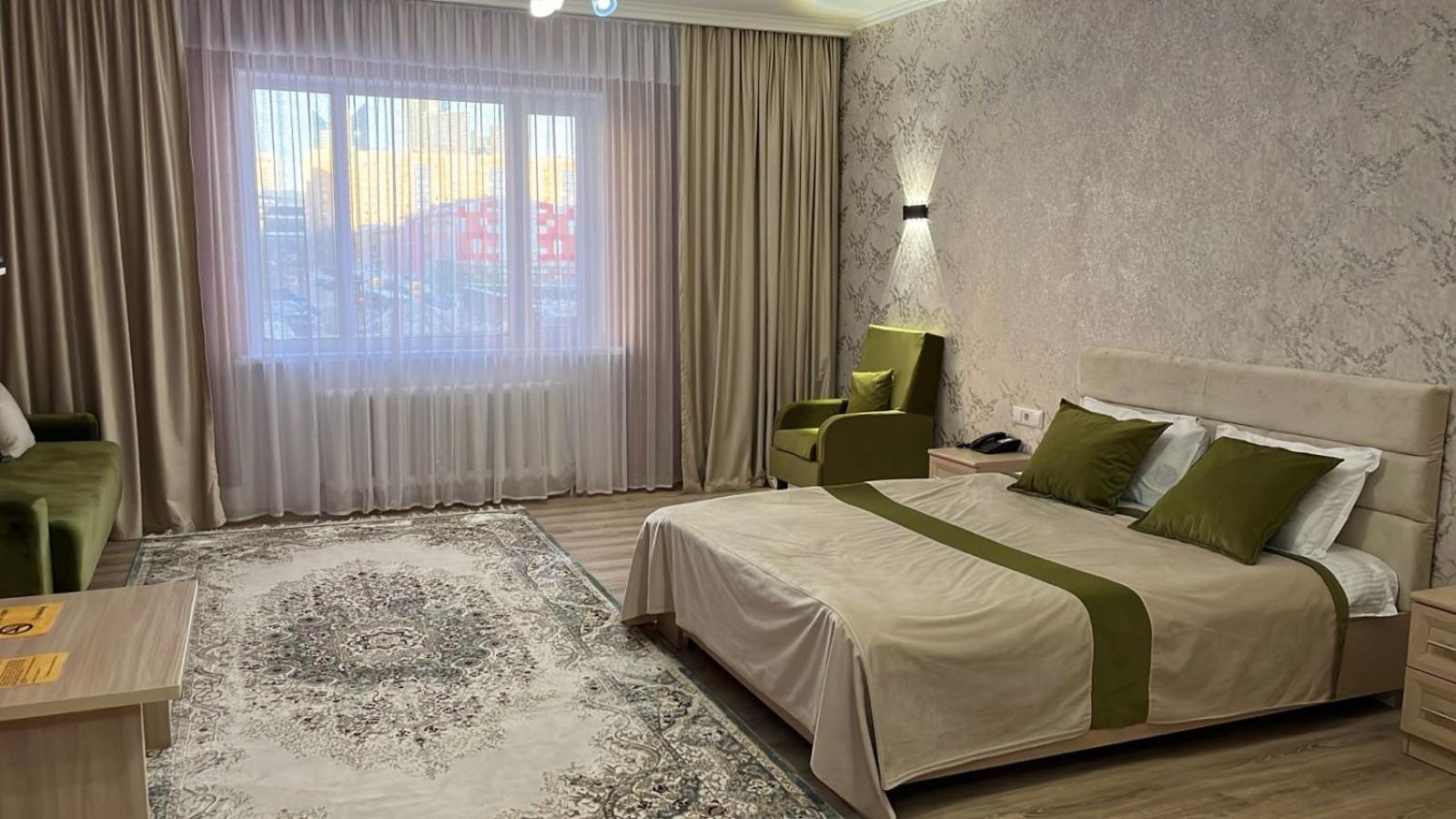 Union Plaza Hotel Astana Bagian luar foto