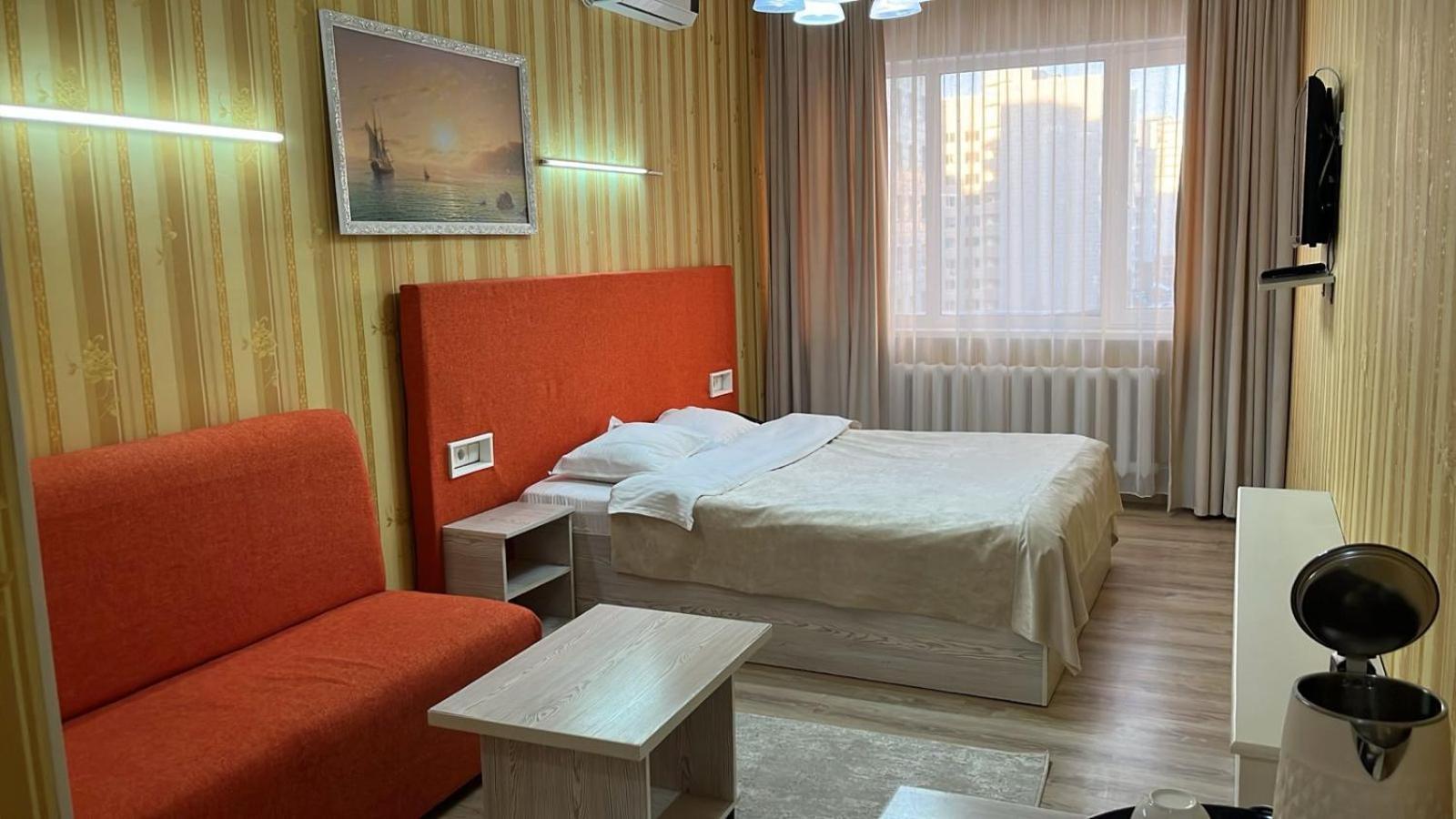 Union Plaza Hotel Astana Bagian luar foto