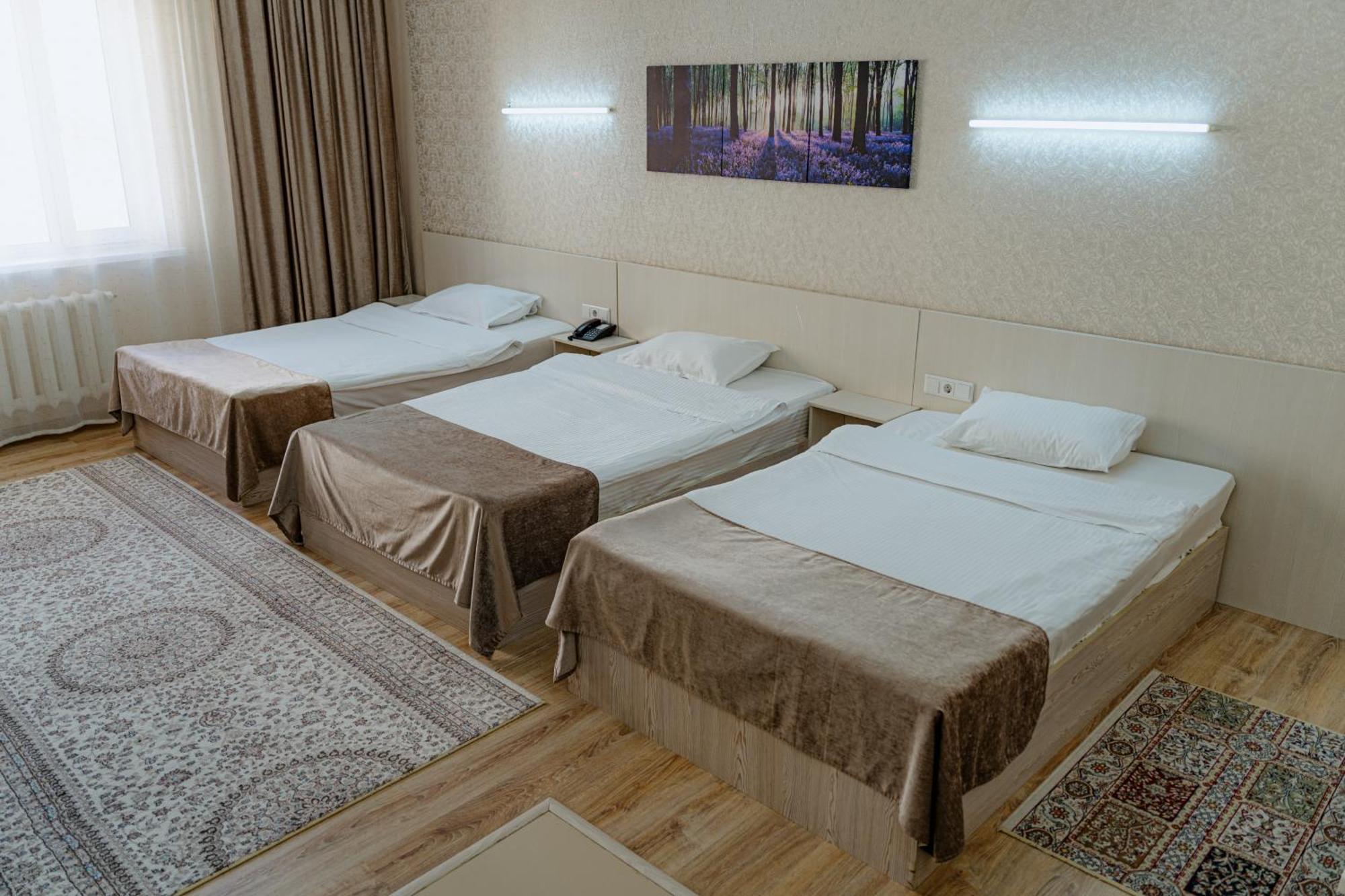 Union Plaza Hotel Astana Bagian luar foto