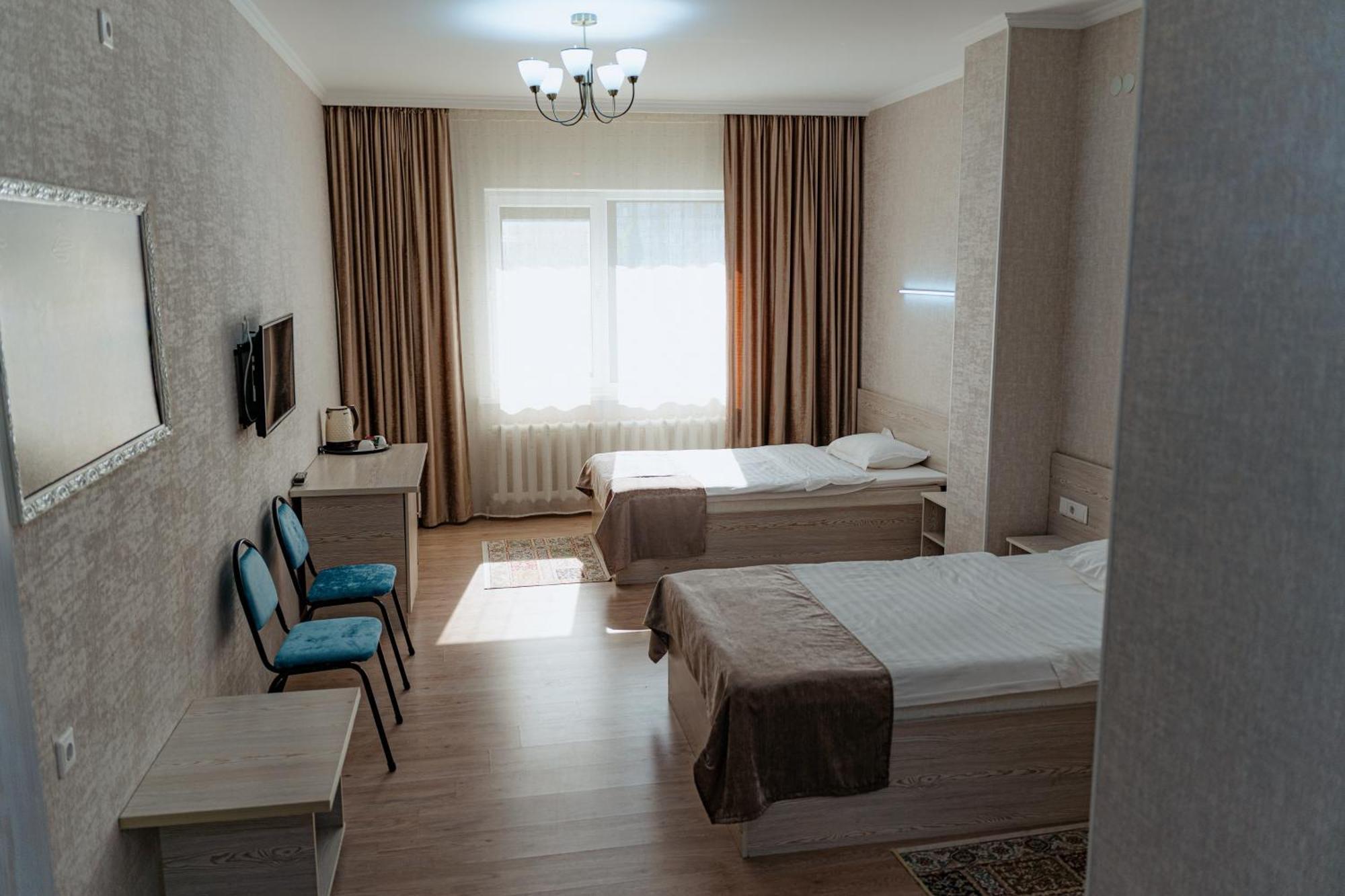 Union Plaza Hotel Astana Bagian luar foto