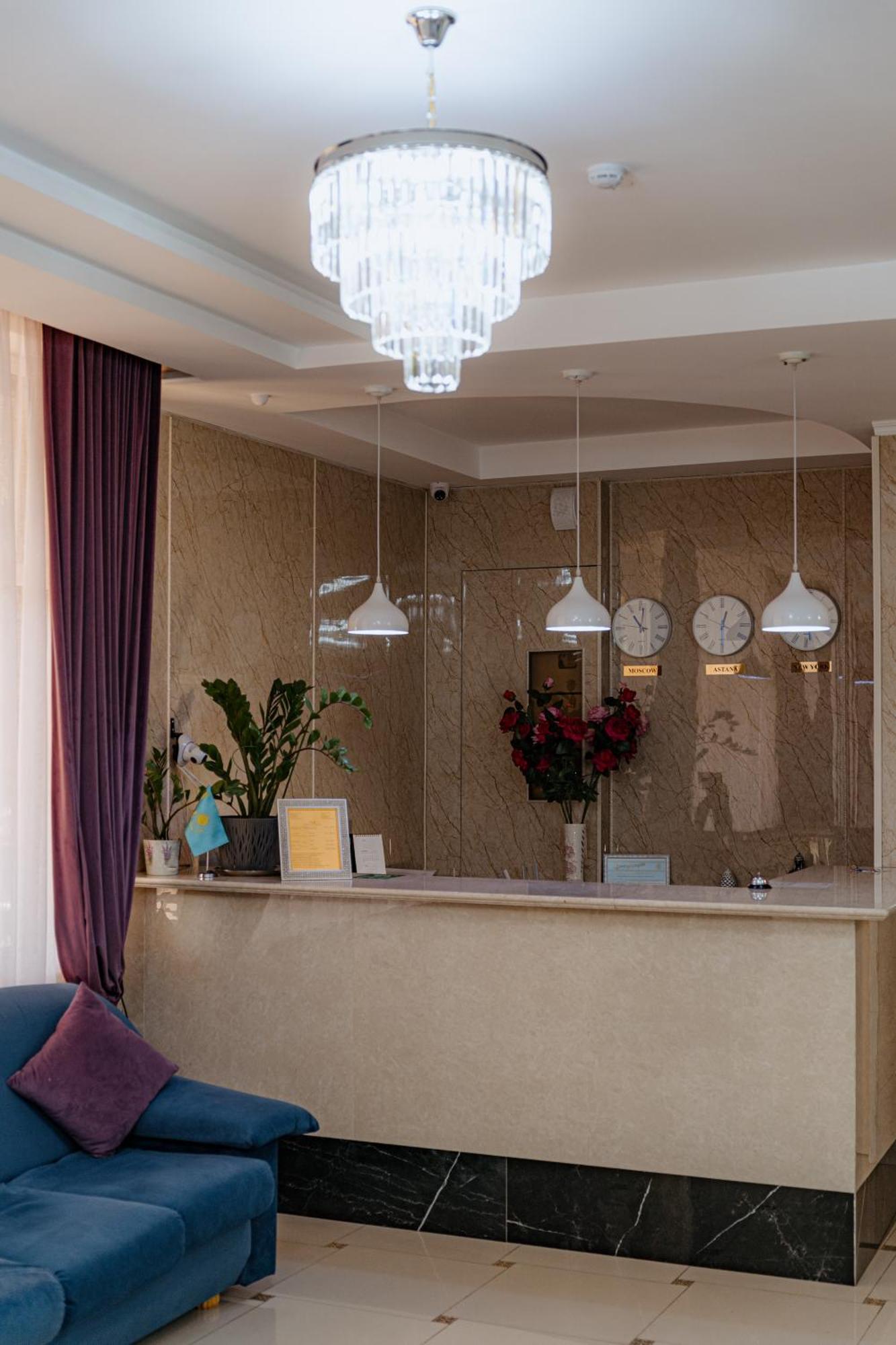 Union Plaza Hotel Astana Bagian luar foto