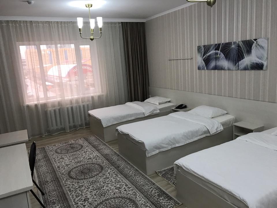Union Plaza Hotel Astana Bagian luar foto