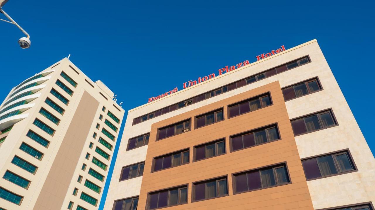 Union Plaza Hotel Astana Bagian luar foto
