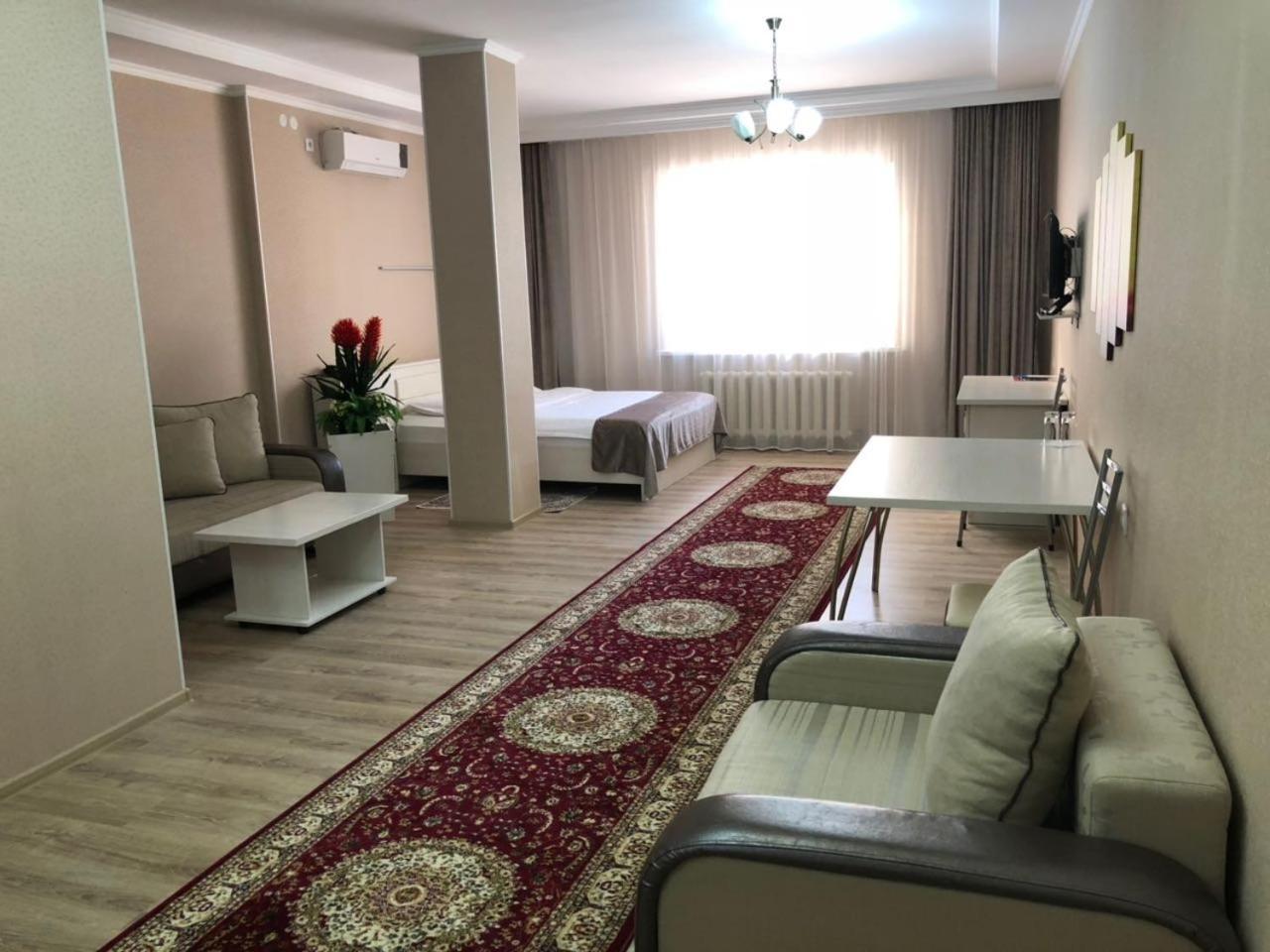 Union Plaza Hotel Astana Bagian luar foto